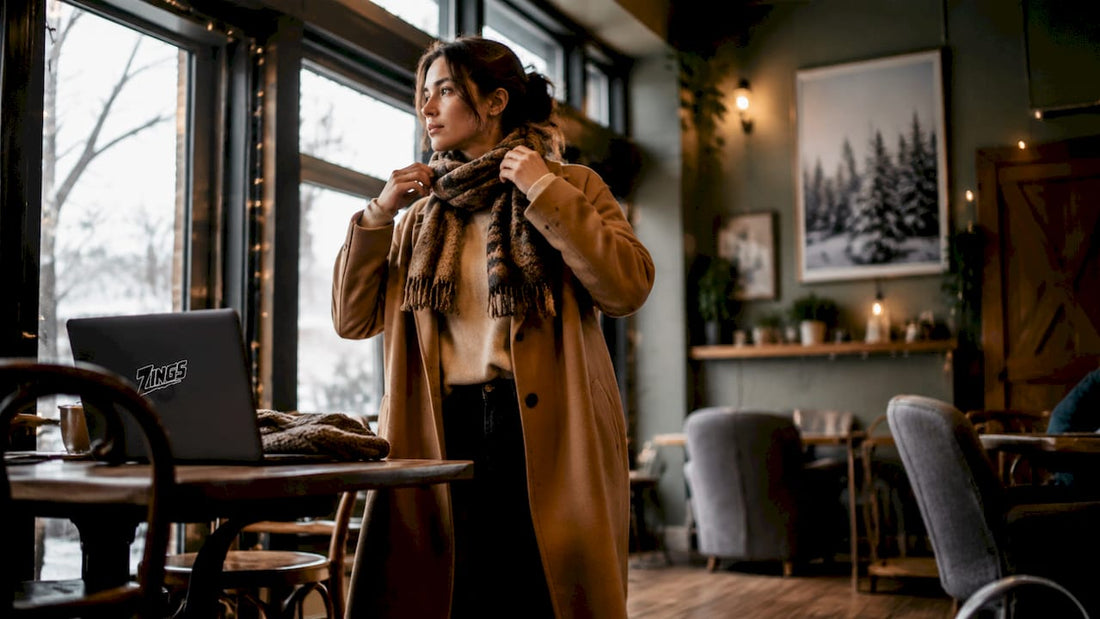 Woman in apartment trying winter coat
