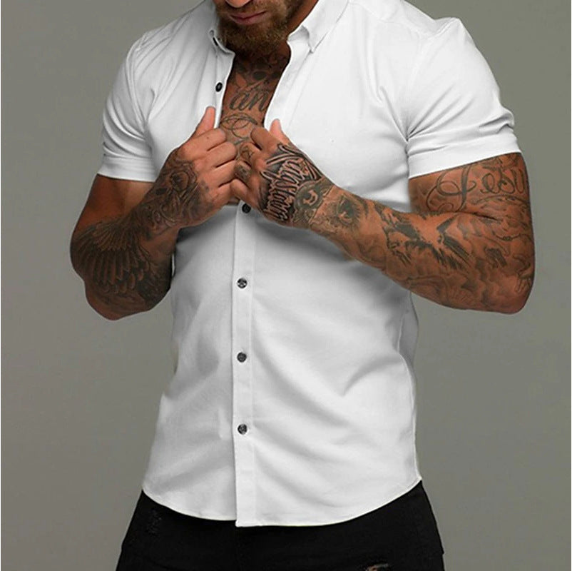 A muscular man in a solid-color lapel short-sleeved shirt